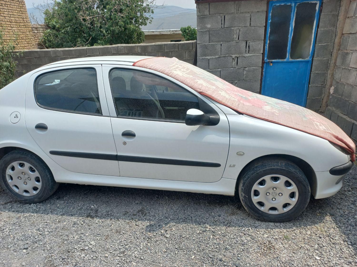 پژو ۲۰۶ صندوق دار v8 - 1394