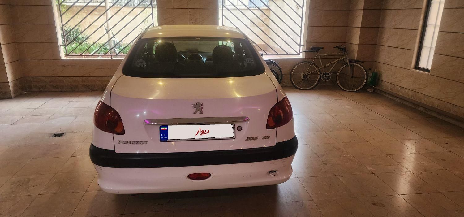 پژو ۲۰۶ صندوق دار v8 - 1396