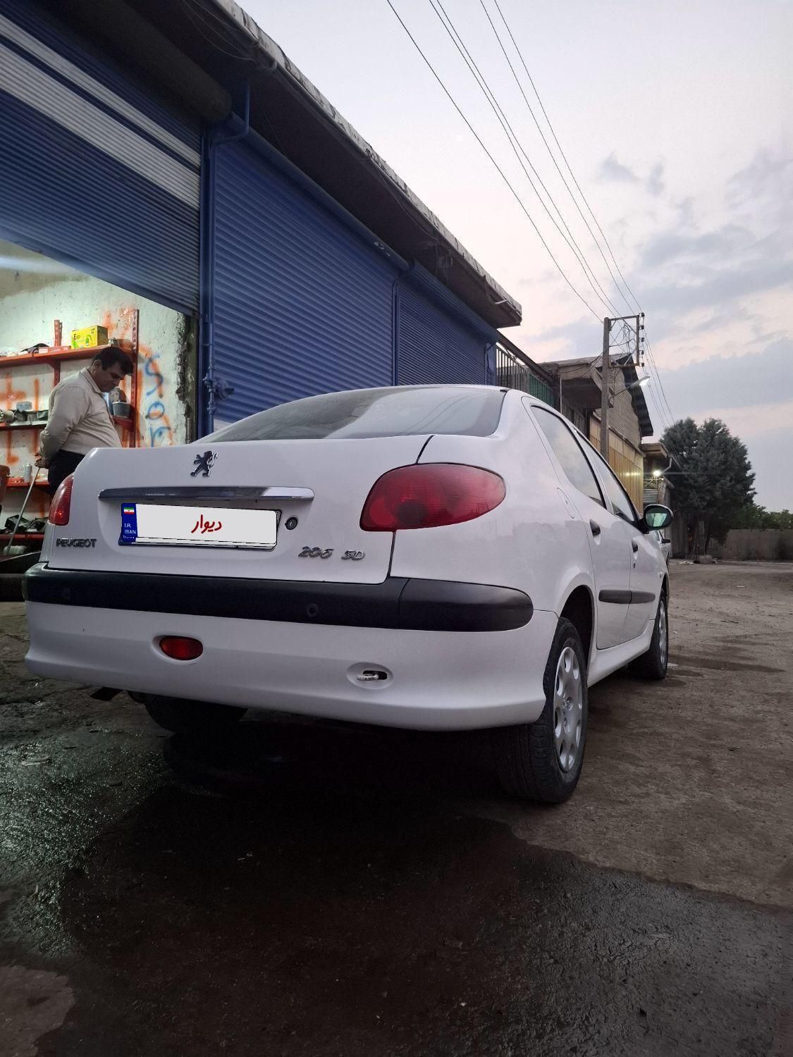 پژو ۲۰۶ صندوق دار v8 - 1396