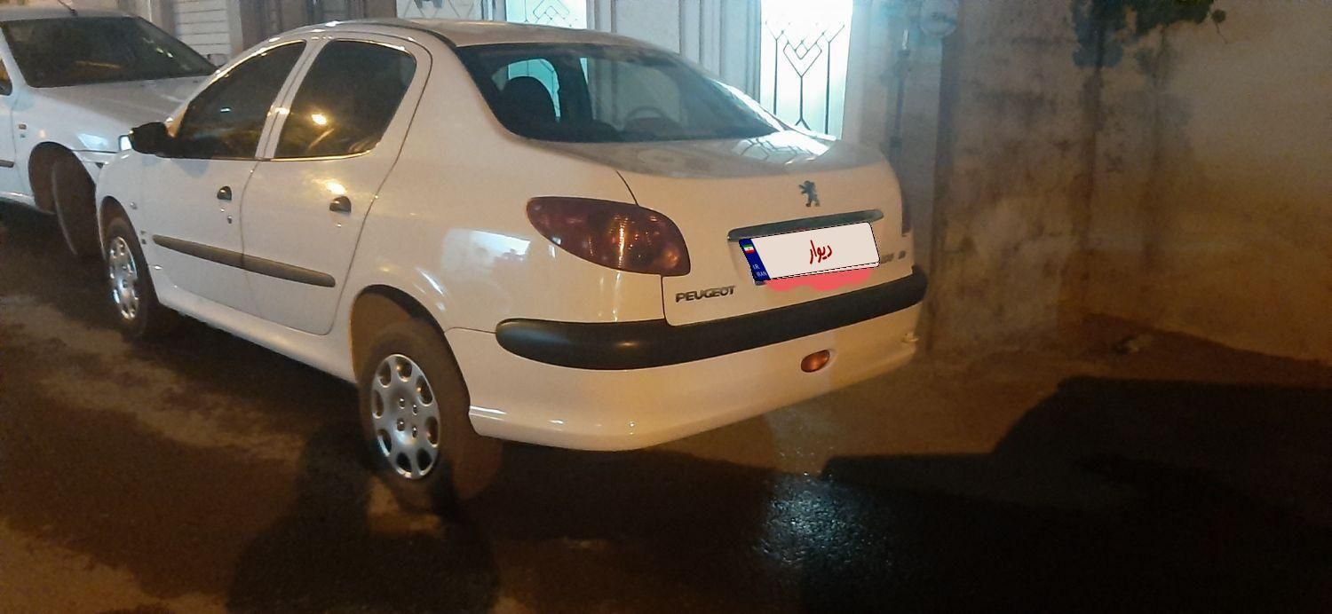 پژو ۲۰۶ صندوق دار v8 - 1396