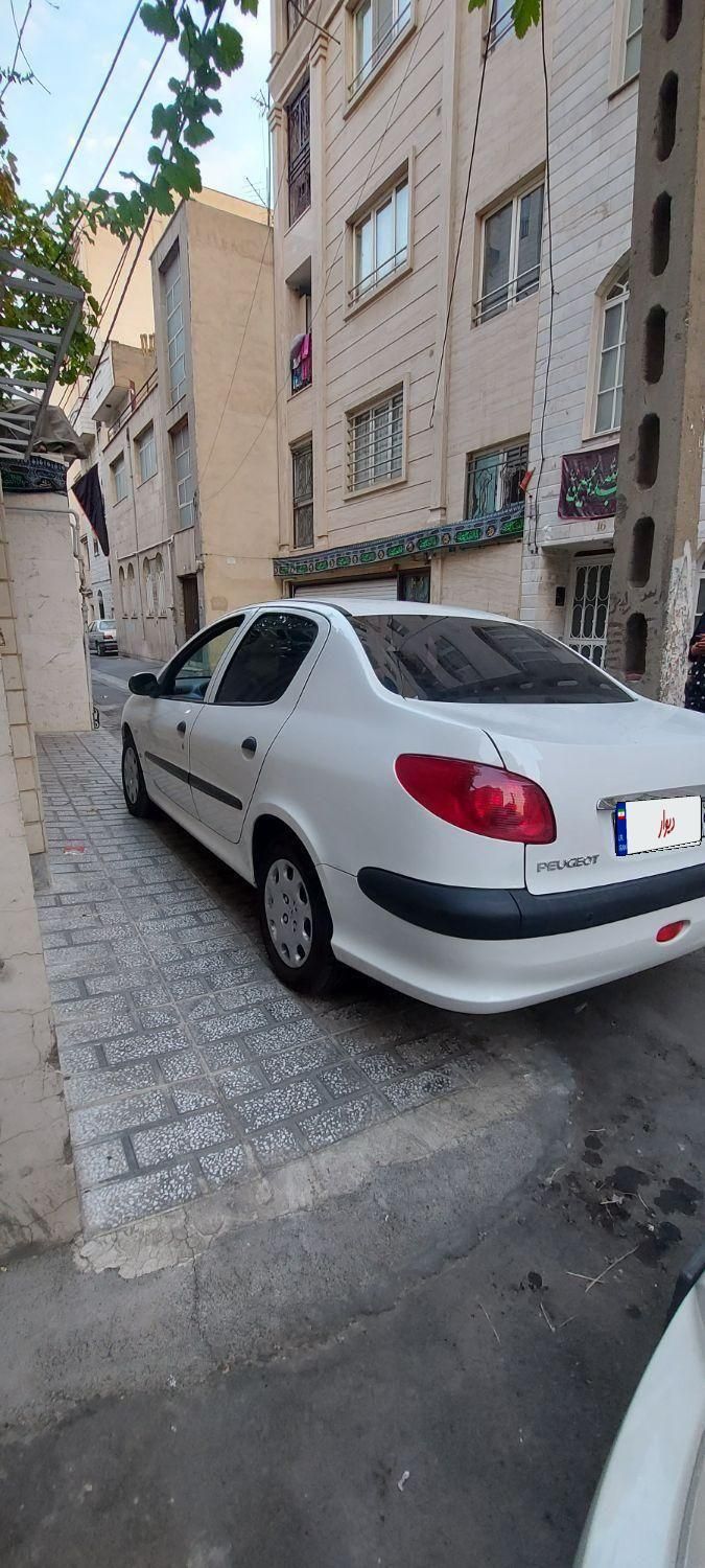 پژو ۲۰۶ صندوق دار v8 - 1395