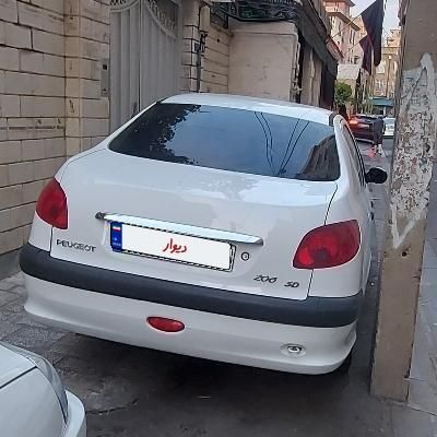 پژو ۲۰۶ صندوق دار v8 - 1395