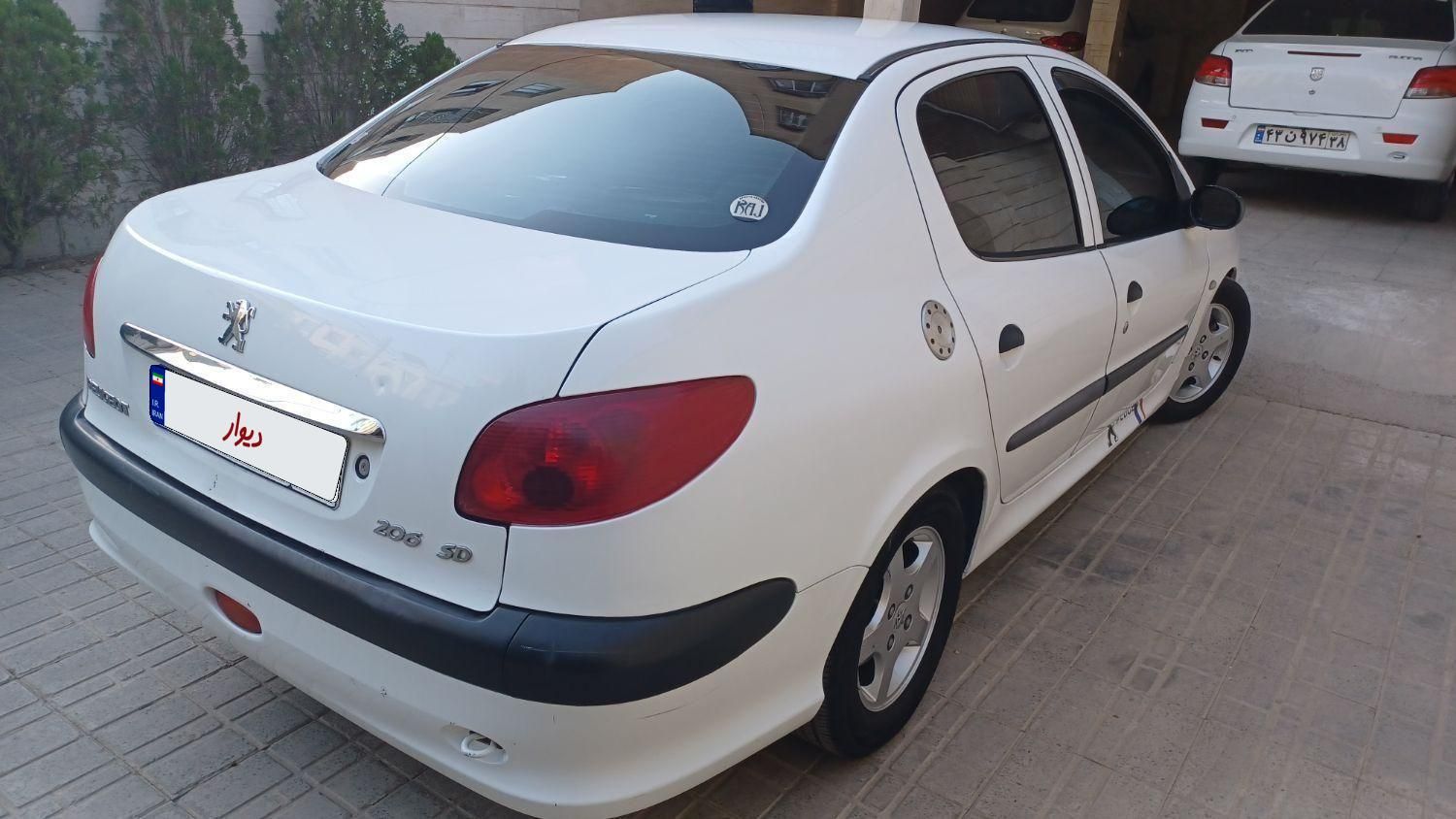 پژو ۲۰۶ صندوق دار v9 - 1390