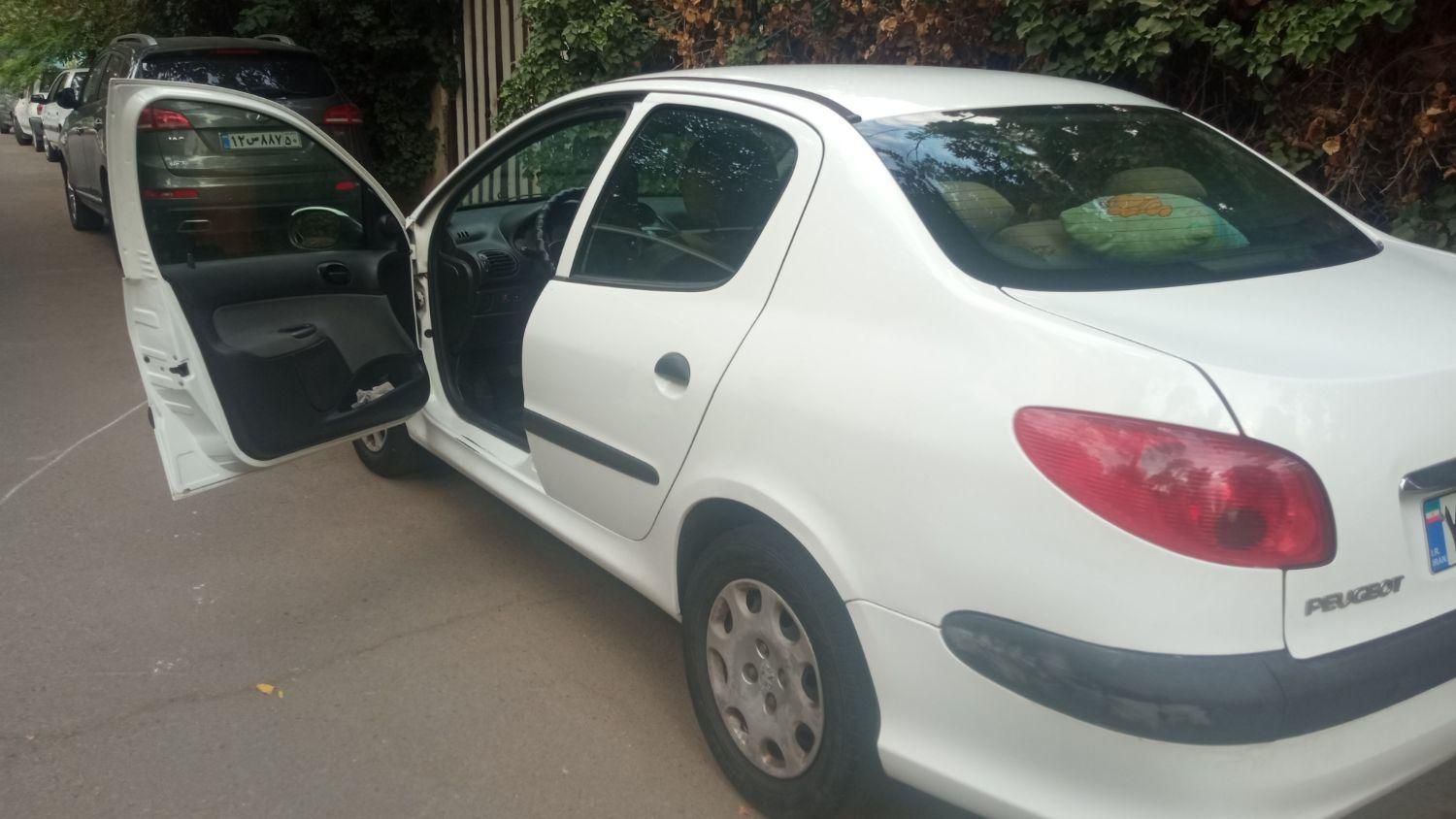 پژو ۲۰۶ صندوق دار v8 - 1396