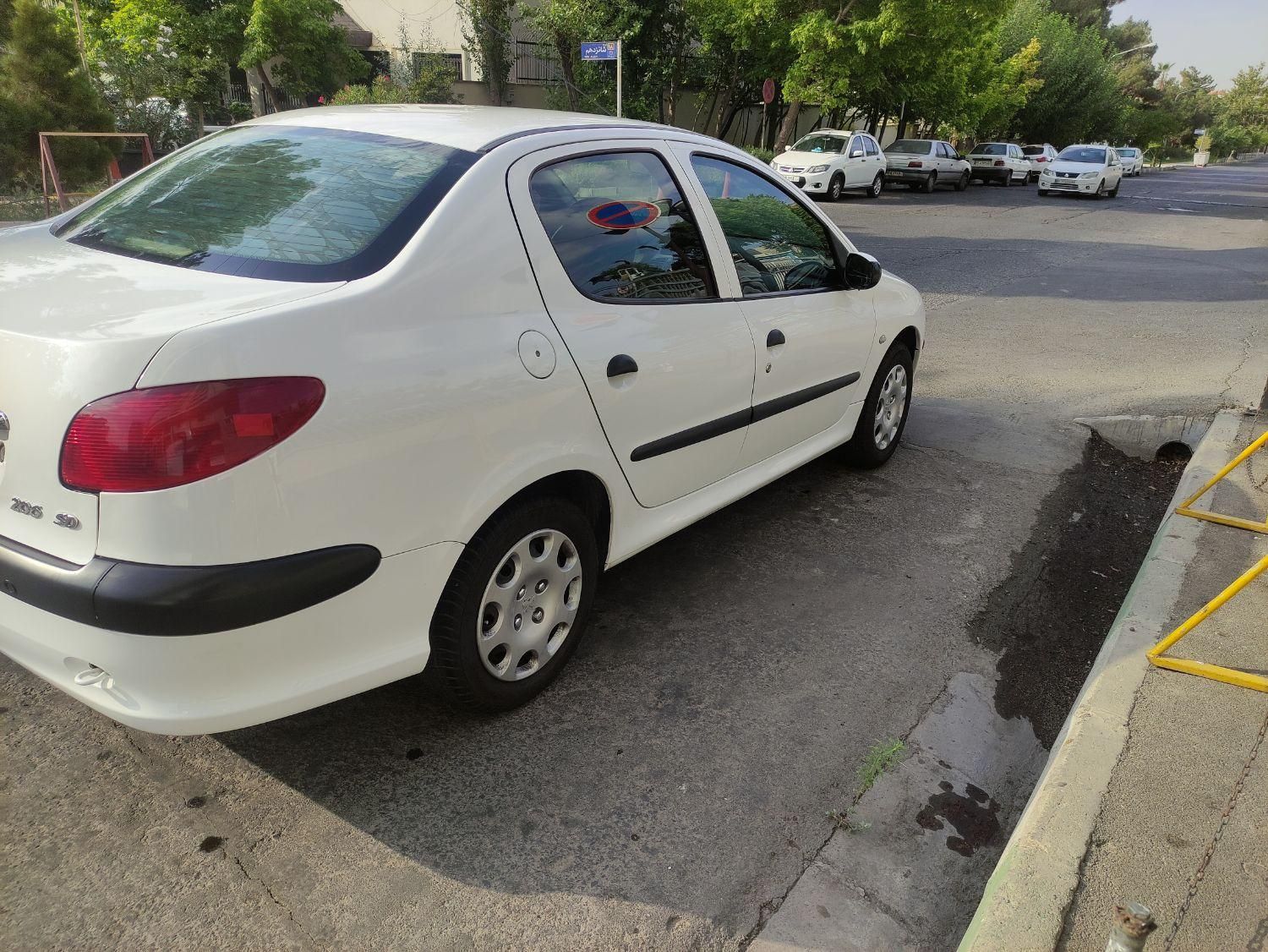 پژو ۲۰۶ صندوق دار v8 - 1397