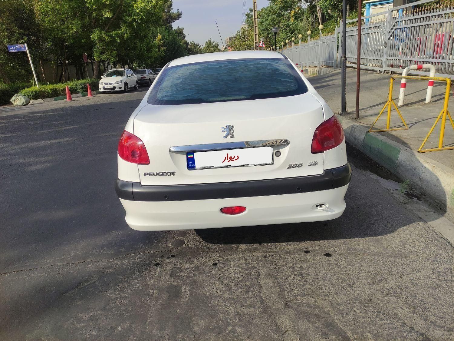 پژو ۲۰۶ صندوق دار v8 - 1397