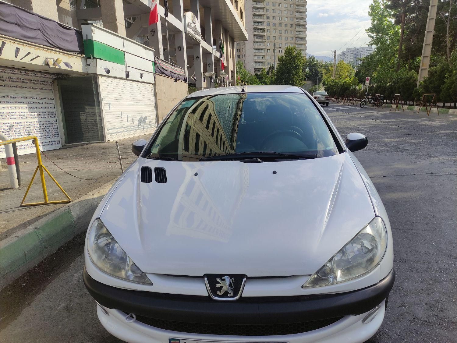 پژو ۲۰۶ صندوق دار v8 - 1397
