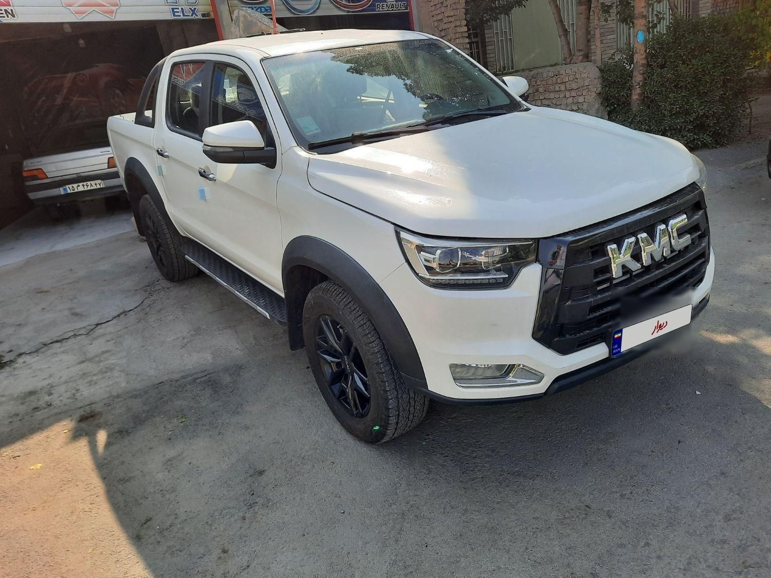 خودرو کی ام سی، T8 آگهی ann_19334714