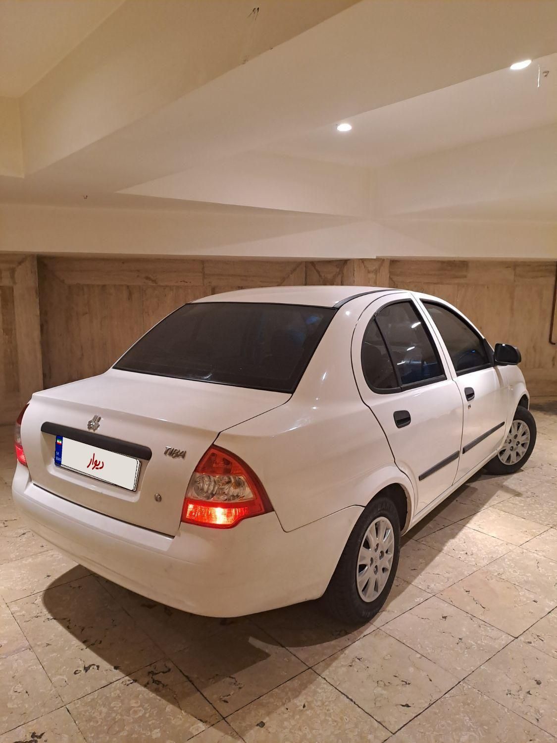 تیبا صندوق دار SX - 1401