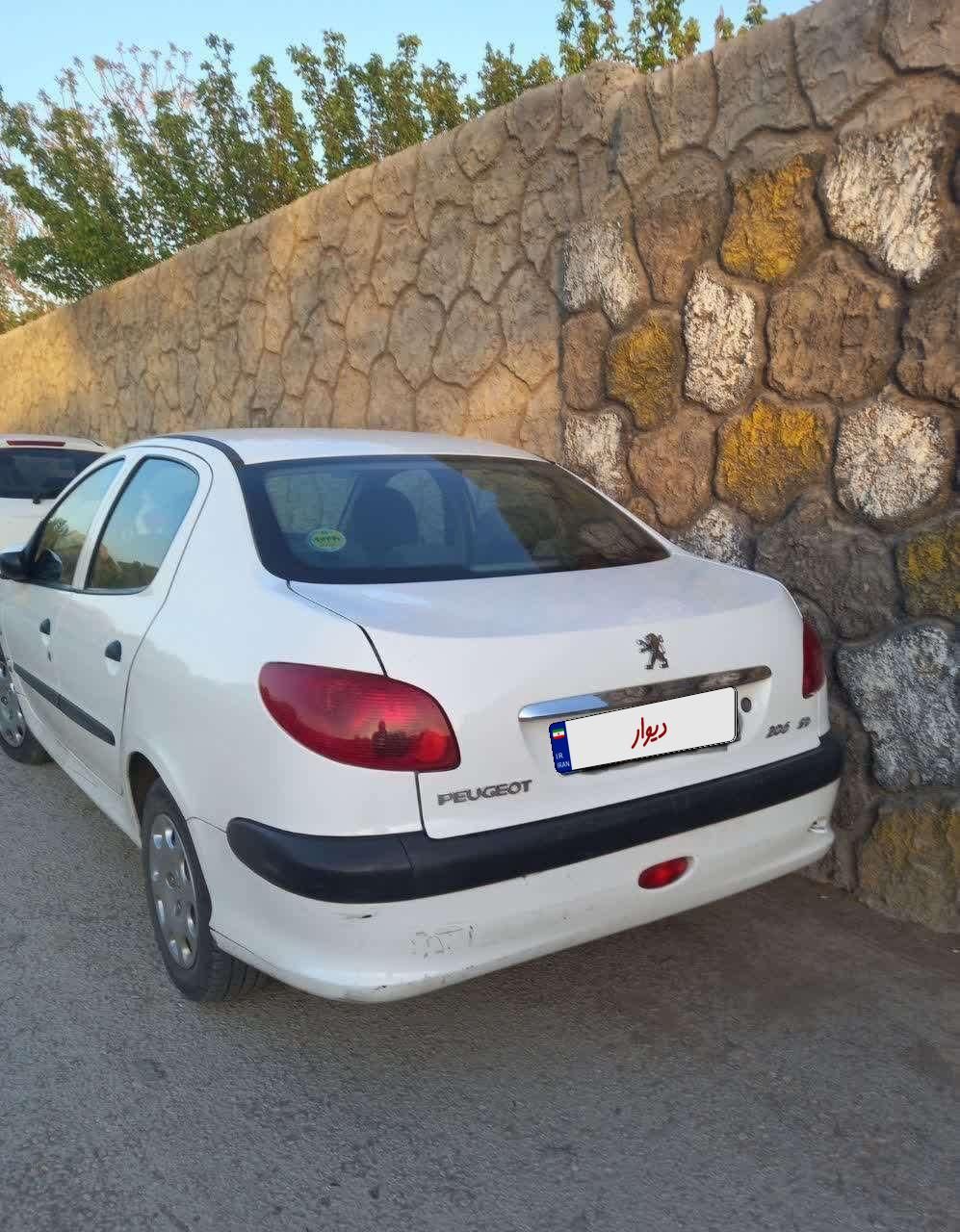 پژو ۲۰۶ صندوق دار v8 - 1399