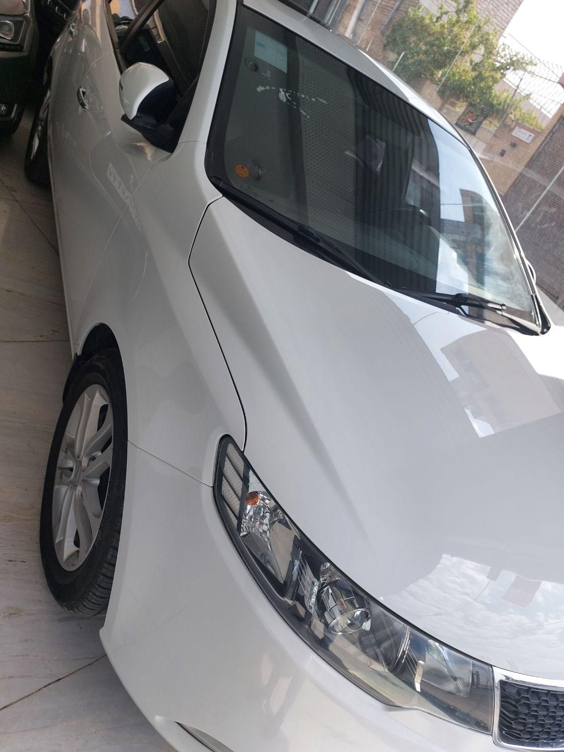 خودرو کیا، سراتو مونتاژ آگهی ann_19338495