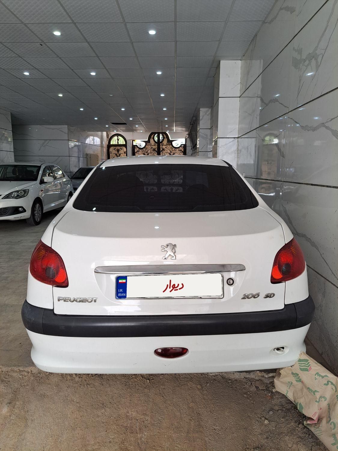 پژو ۲۰۶ صندوق دار v8 - 1390