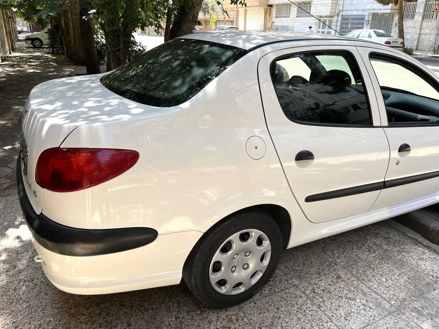 پژو ۲۰۶ صندوق دار v8 - 1395