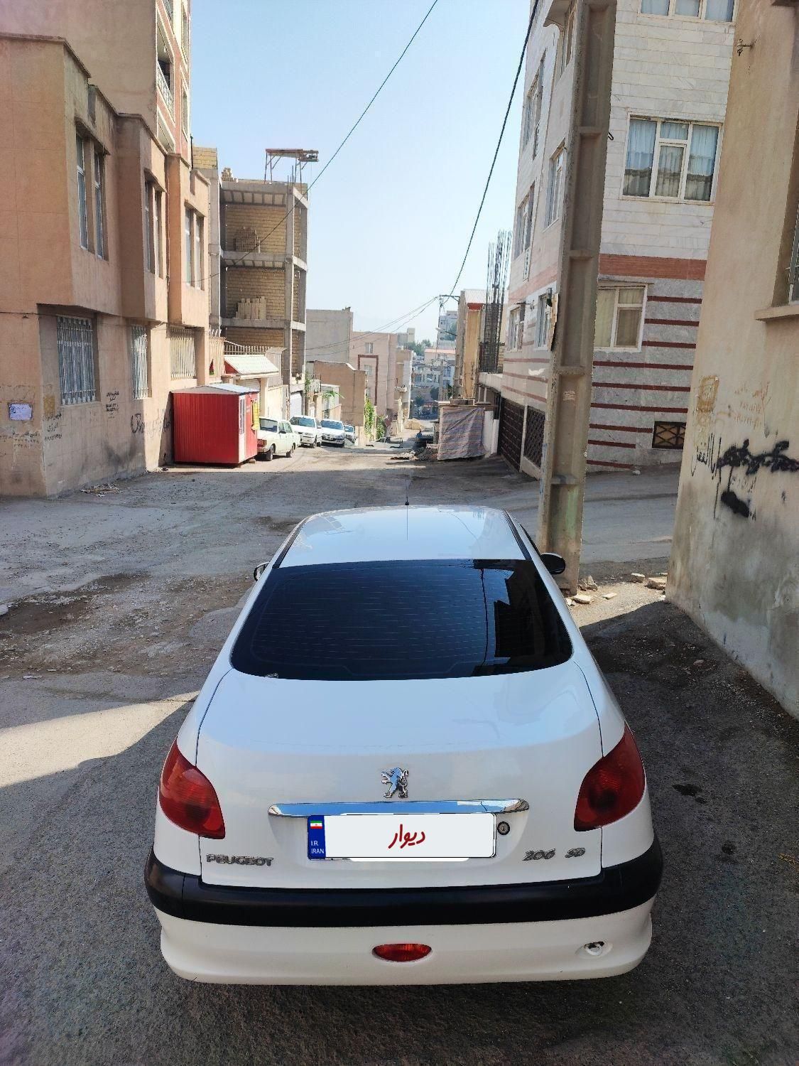 پژو ۲۰۶ صندوق دار v8 - 1391