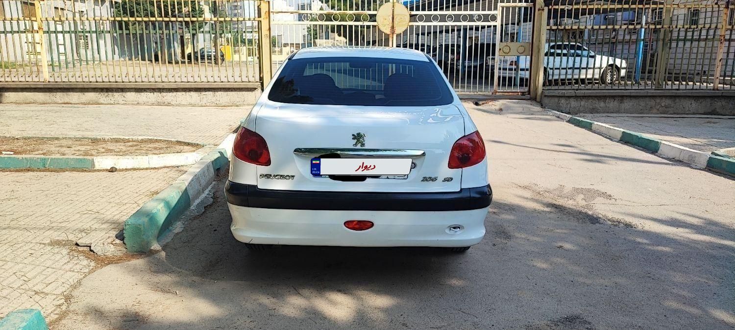 پژو ۲۰۶ صندوق دار v8 - 1391