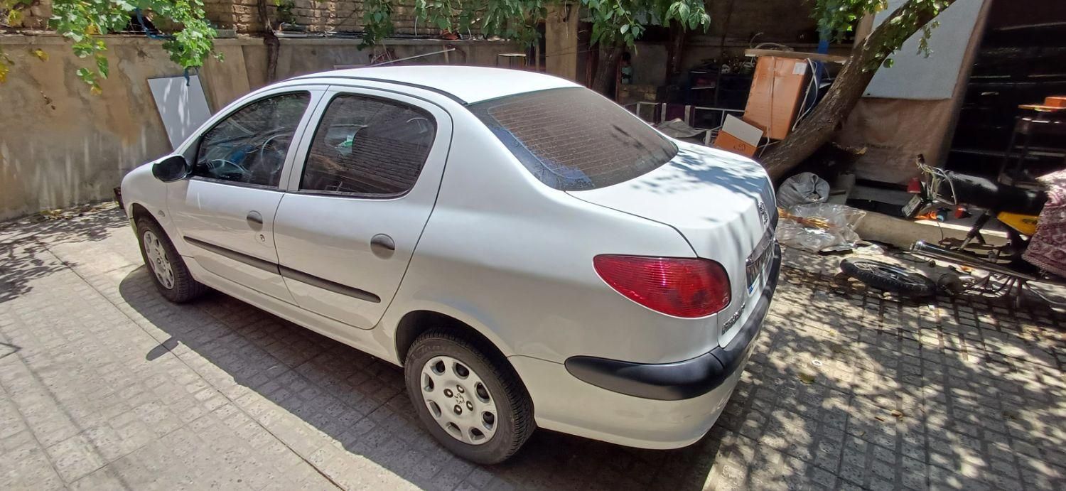 پژو ۲۰۶ صندوق دار v8 - 1397