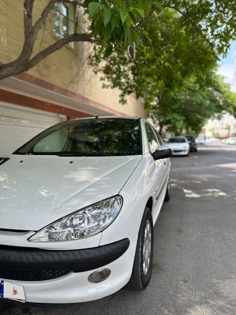 پژو ۲۰۶ صندوق دار v8 - 1396