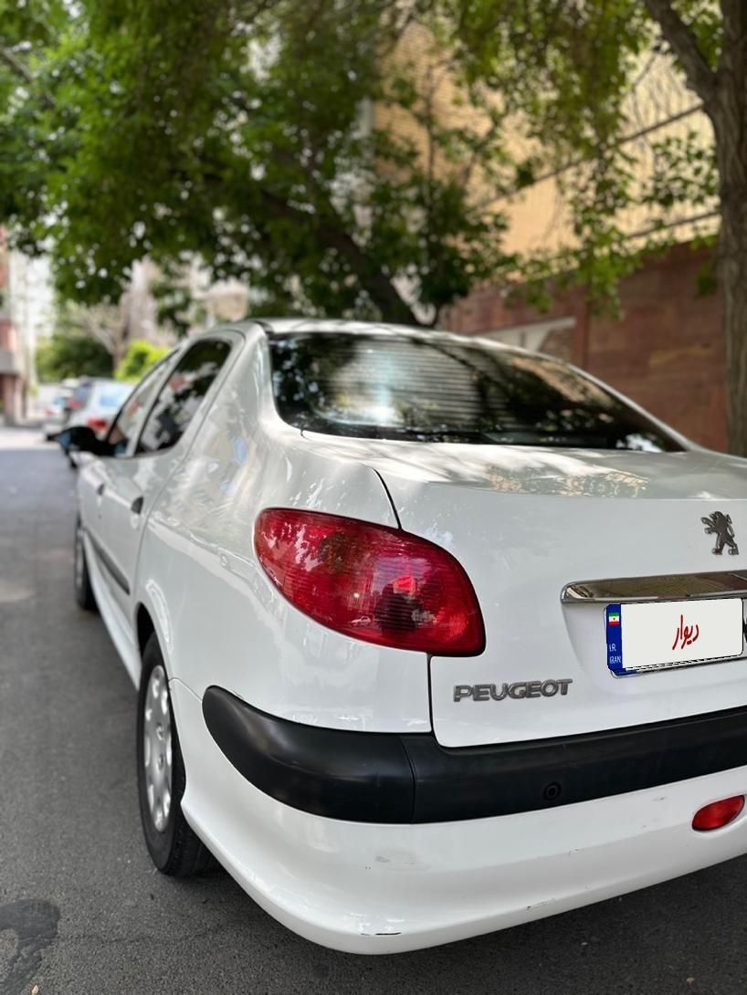 پژو ۲۰۶ صندوق دار v8 - 1396