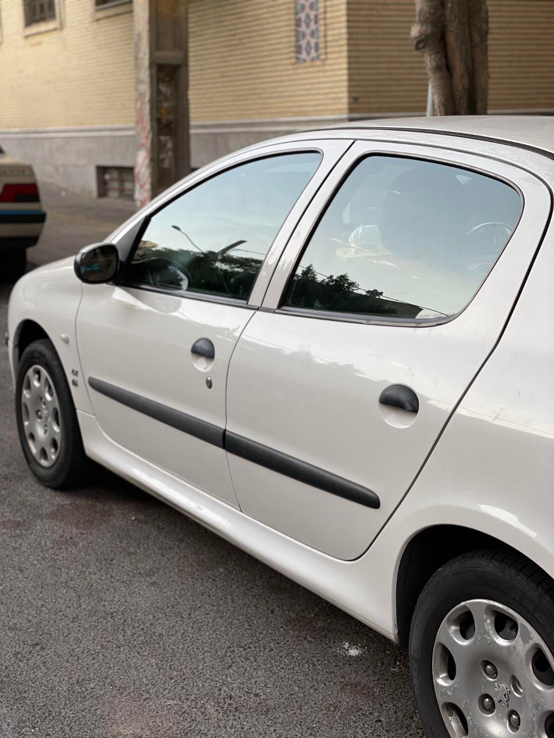 پژو ۲۰۶ صندوق دار v8 - 1395