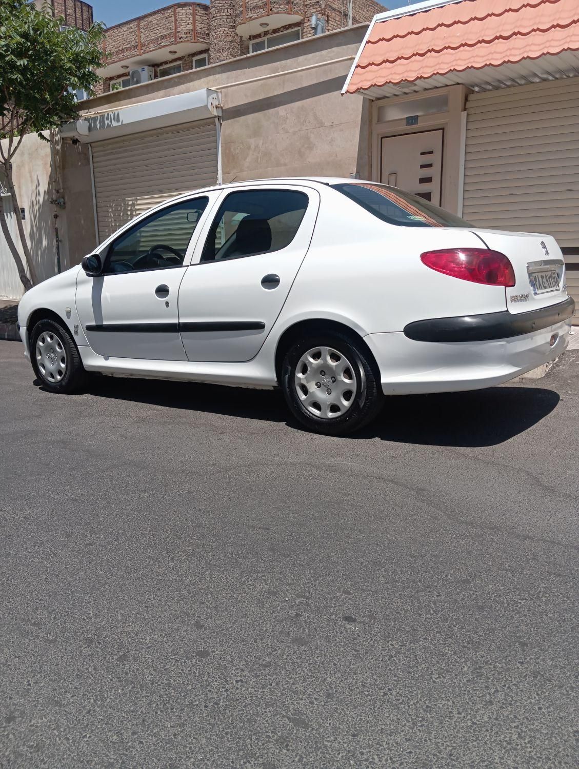 پژو ۲۰۶ صندوق دار v8 - 1396
