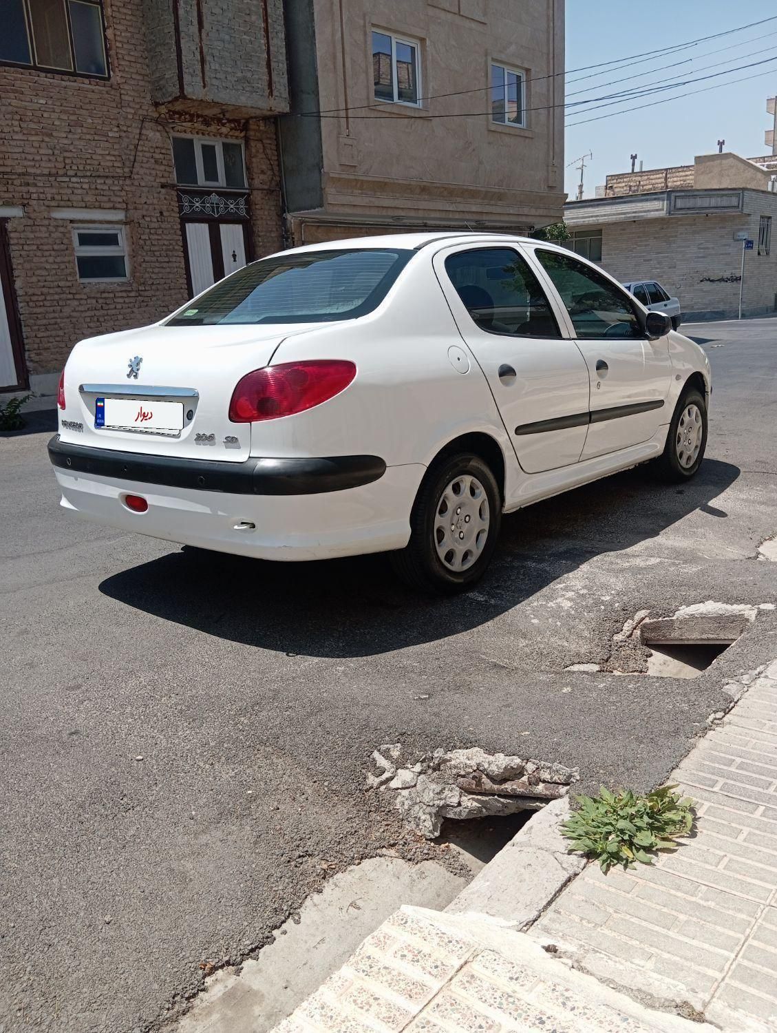 پژو ۲۰۶ صندوق دار v8 - 1396