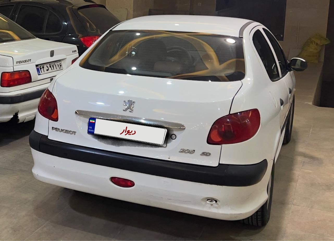 پژو ۲۰۶ صندوق دار v8 - 1396