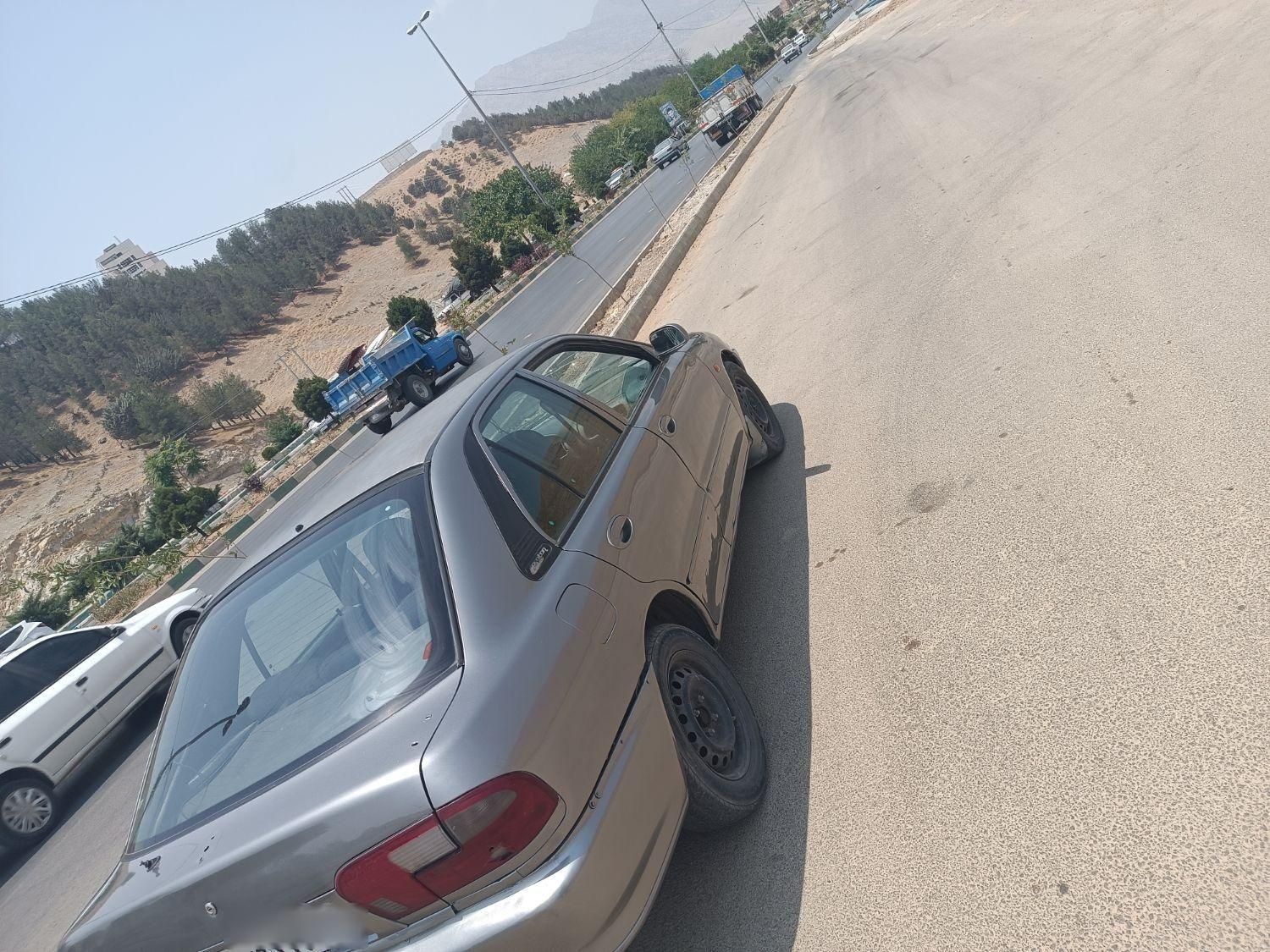 پروتون ویرا دنده‌ای سدان - 1383