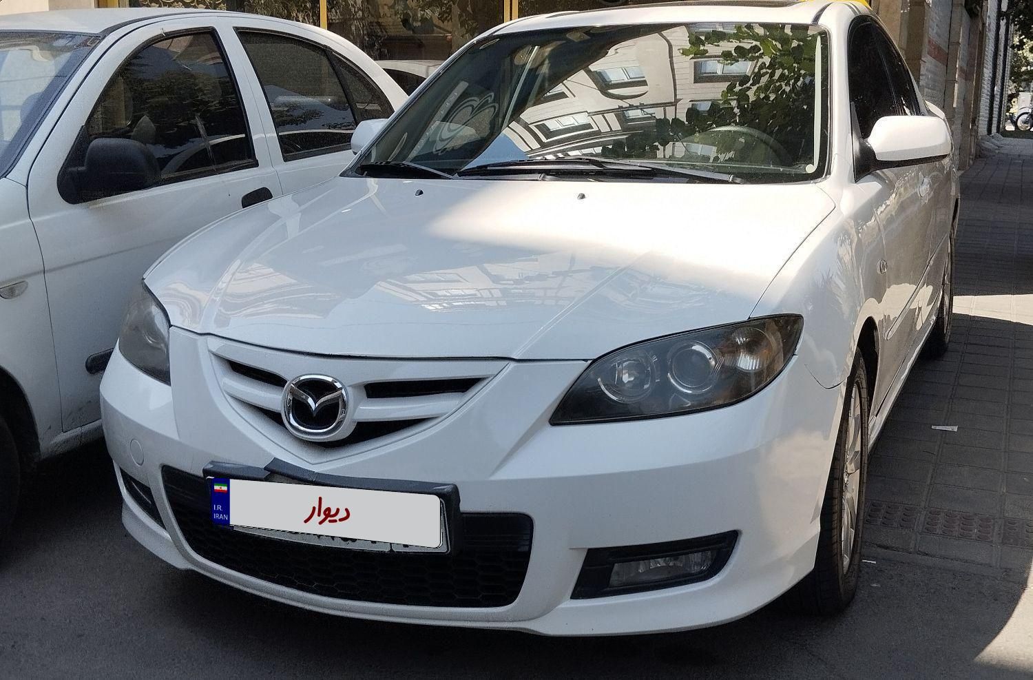 خودرو مزدا، 3 (مونتاژ) آگهی ann_19346379