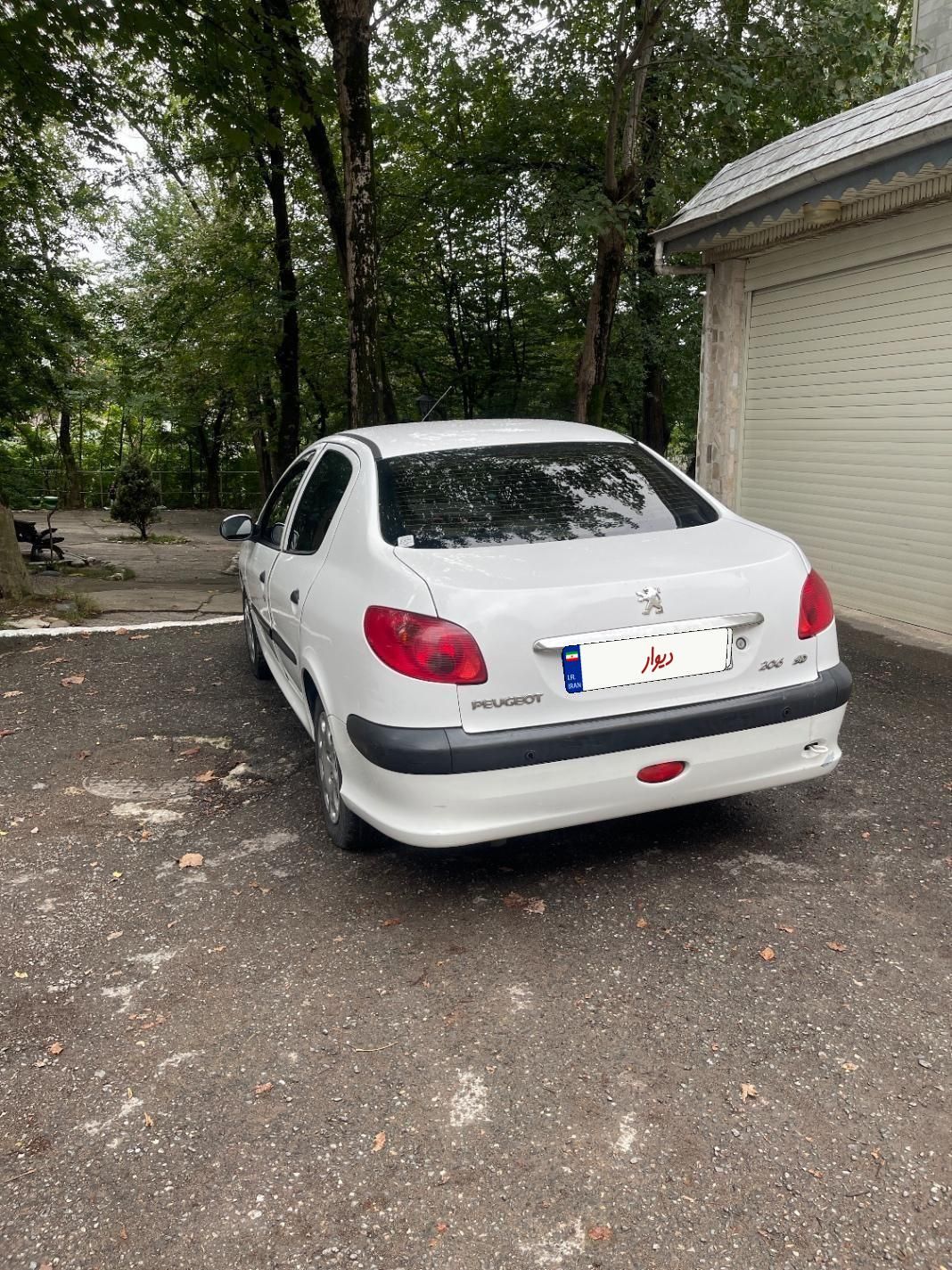 پژو ۲۰۶ صندوق دار v8 - 1396