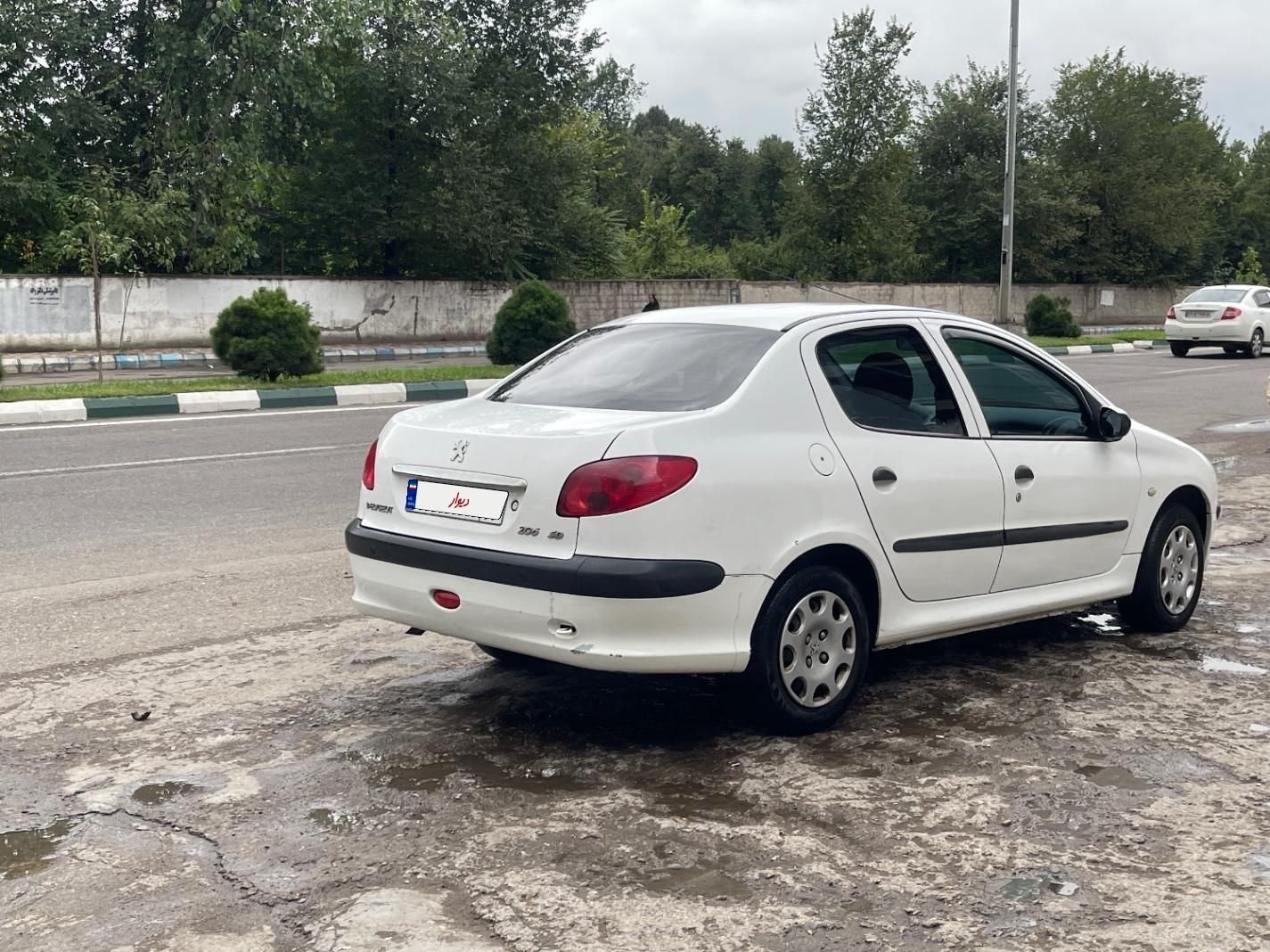 پژو ۲۰۶ صندوق دار v8 - 1396