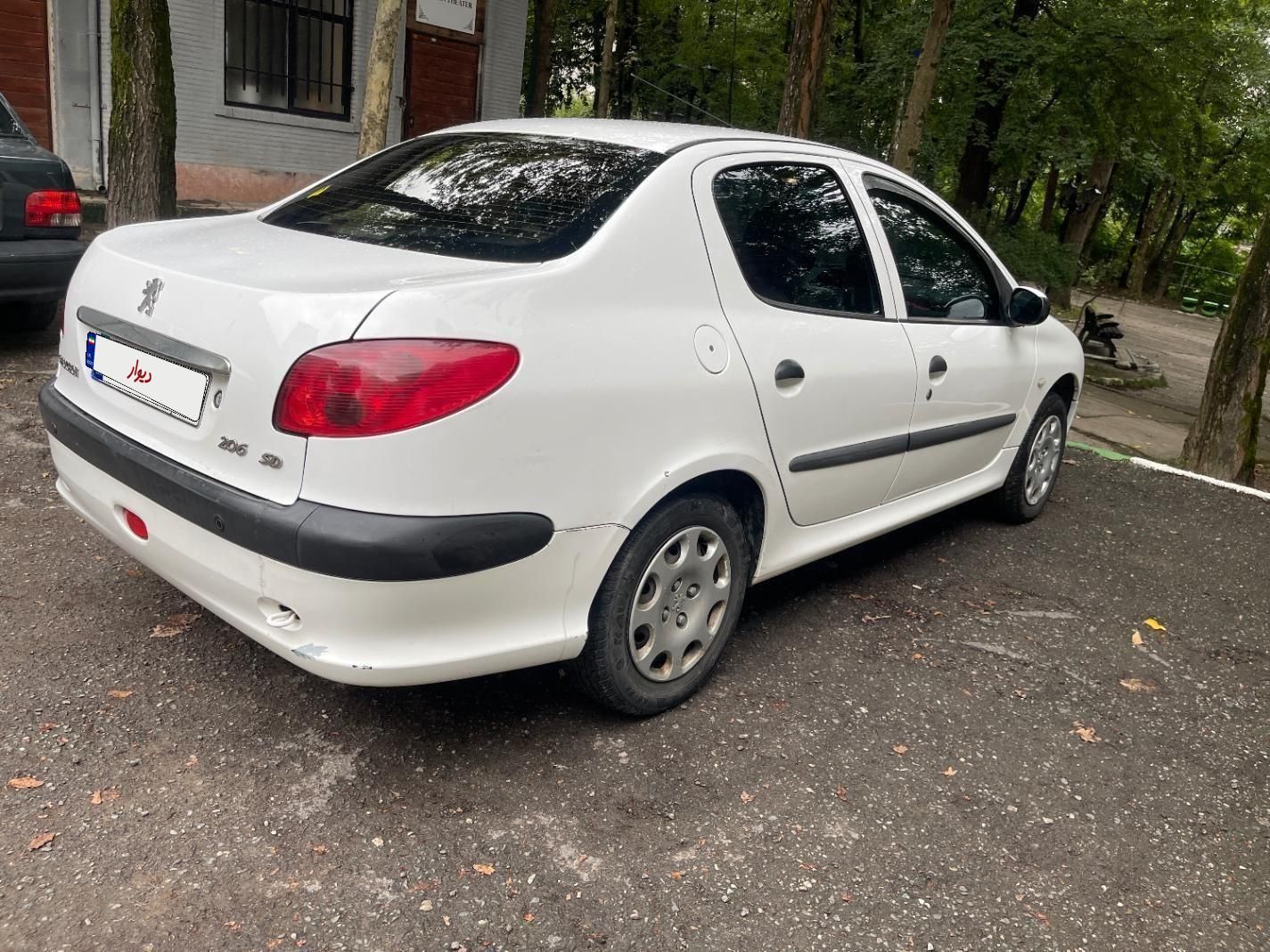 پژو ۲۰۶ صندوق دار v8 - 1396