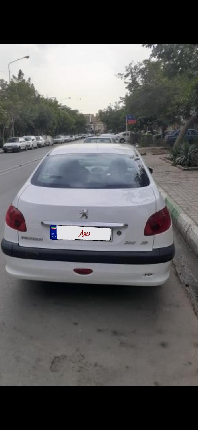 پژو ۲۰۶ صندوق دار v8 - 1400