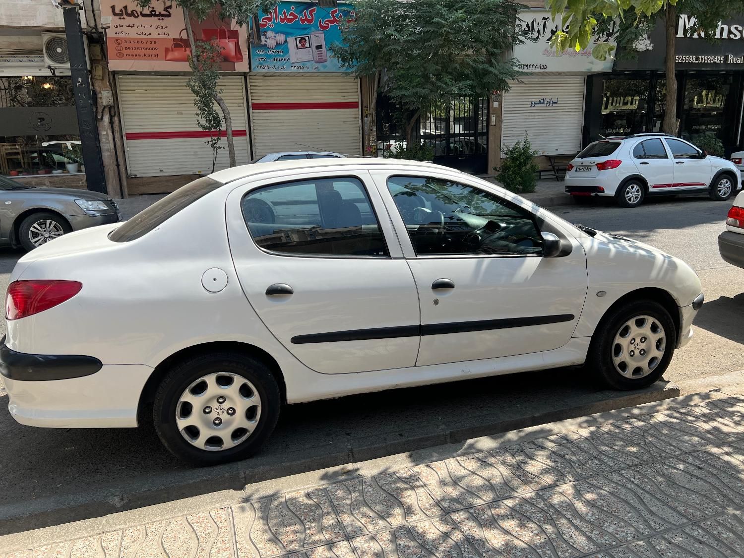 پژو ۲۰۶ صندوق دار v8 - 1394