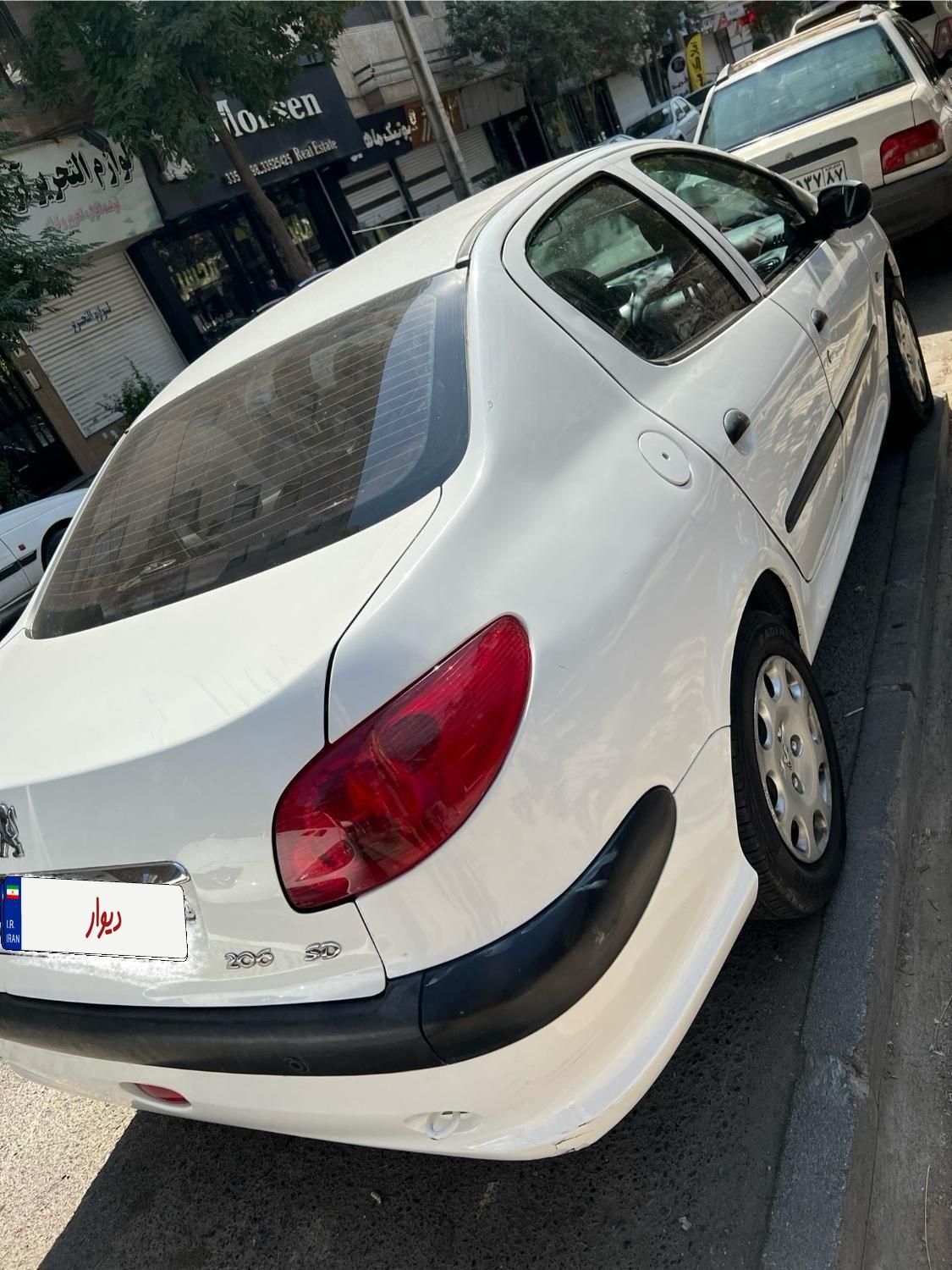 پژو ۲۰۶ صندوق دار v8 - 1394