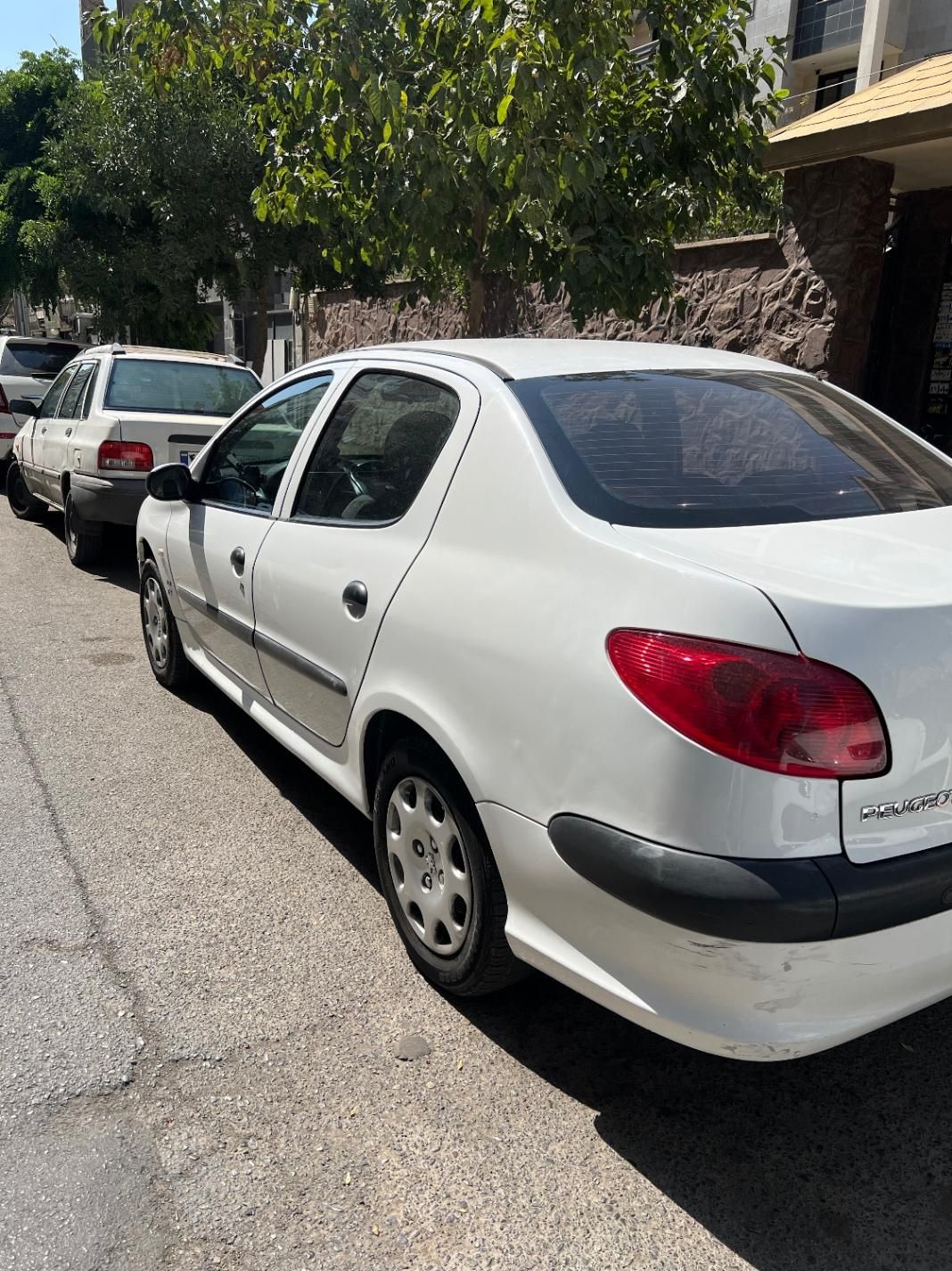 پژو ۲۰۶ صندوق دار v8 - 1394