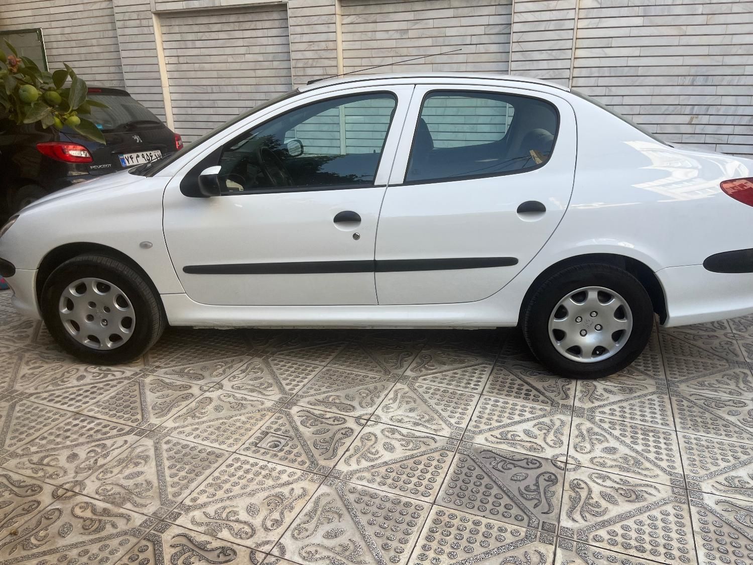 پژو ۲۰۶ صندوق دار v8 - 1396