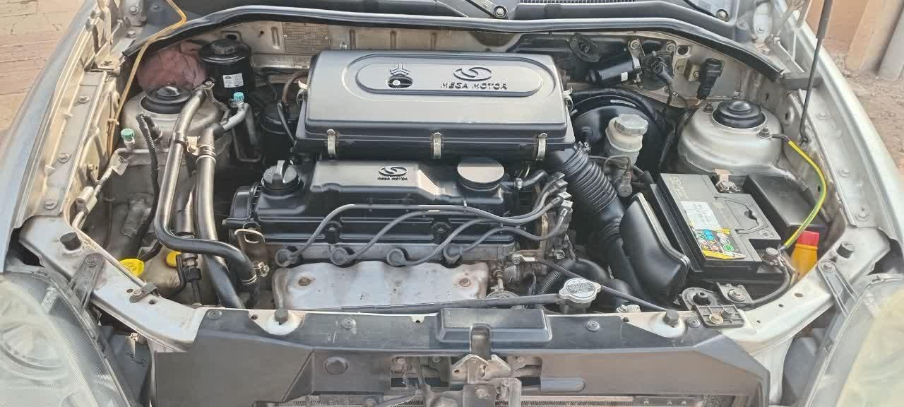 تیبا صندوق دار SX - 1391