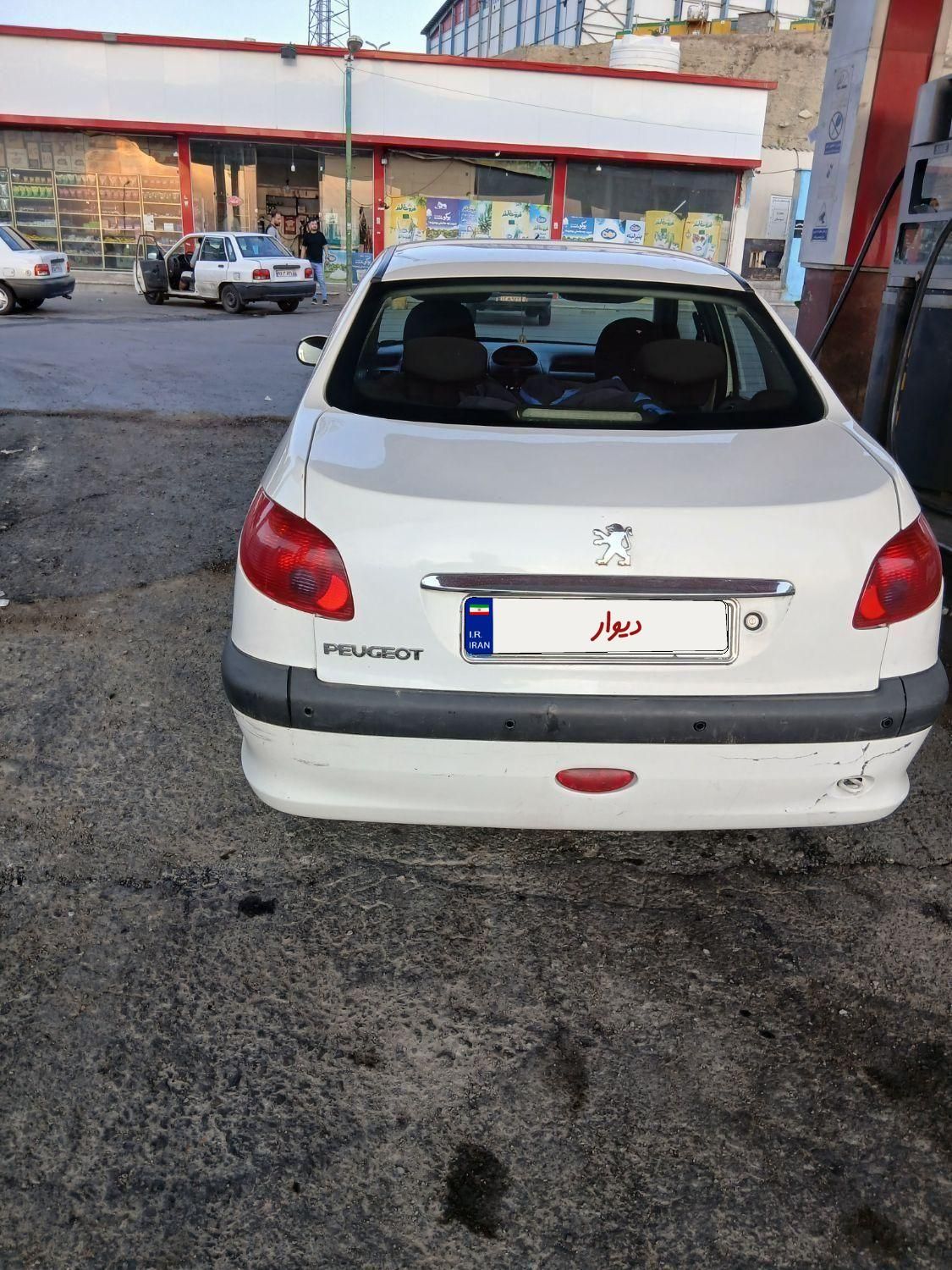 پژو ۲۰۶ صندوق دار v8 - 1391