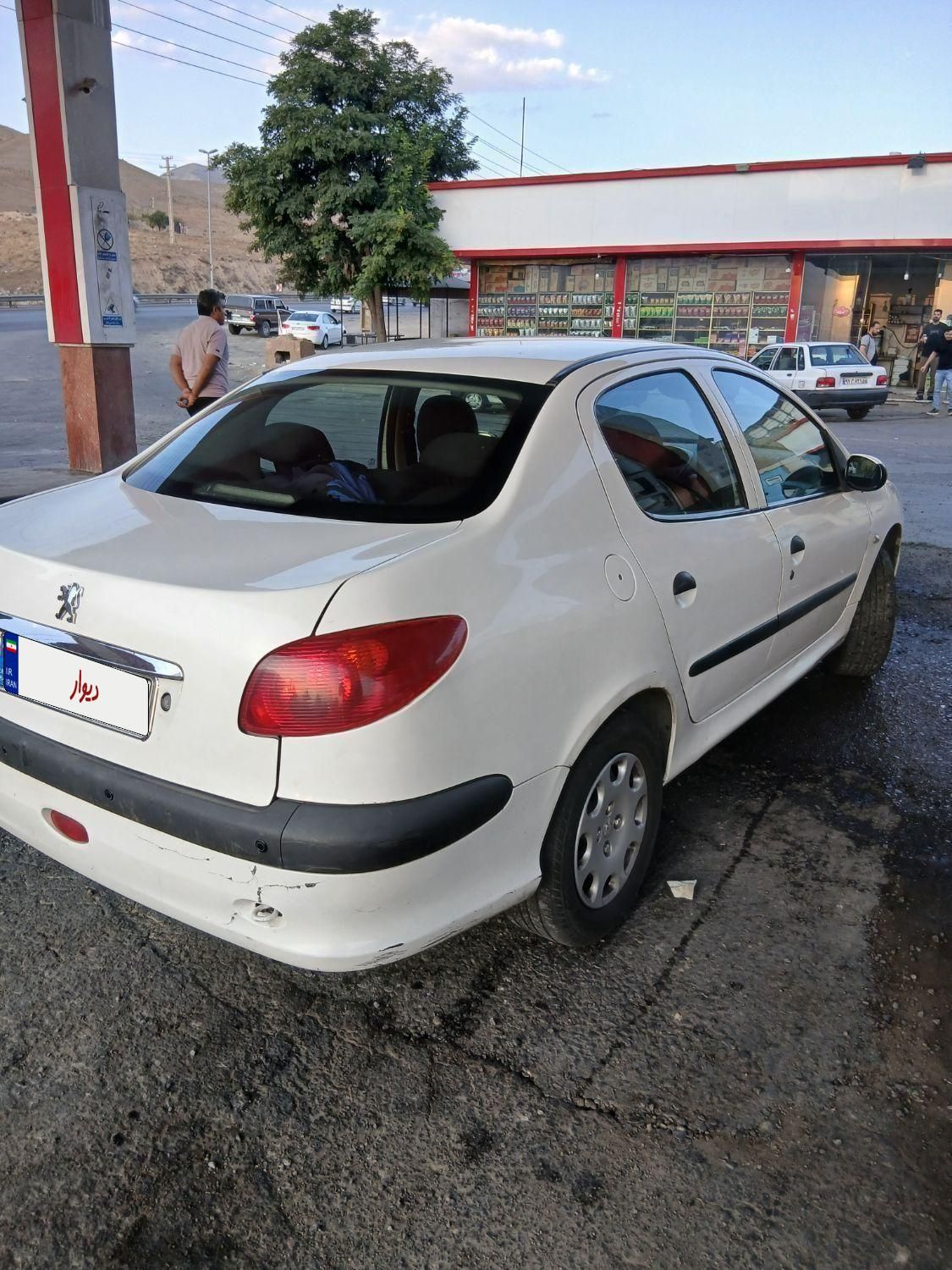 پژو ۲۰۶ صندوق دار v8 - 1391