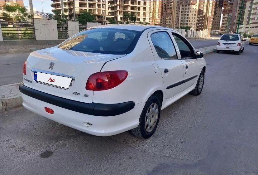 پژو ۲۰۶ صندوق دار v8 - 1394