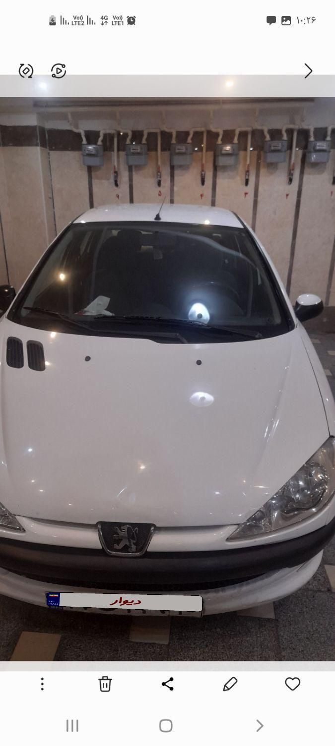 پژو ۲۰۶ صندوق دار v8 - 1396