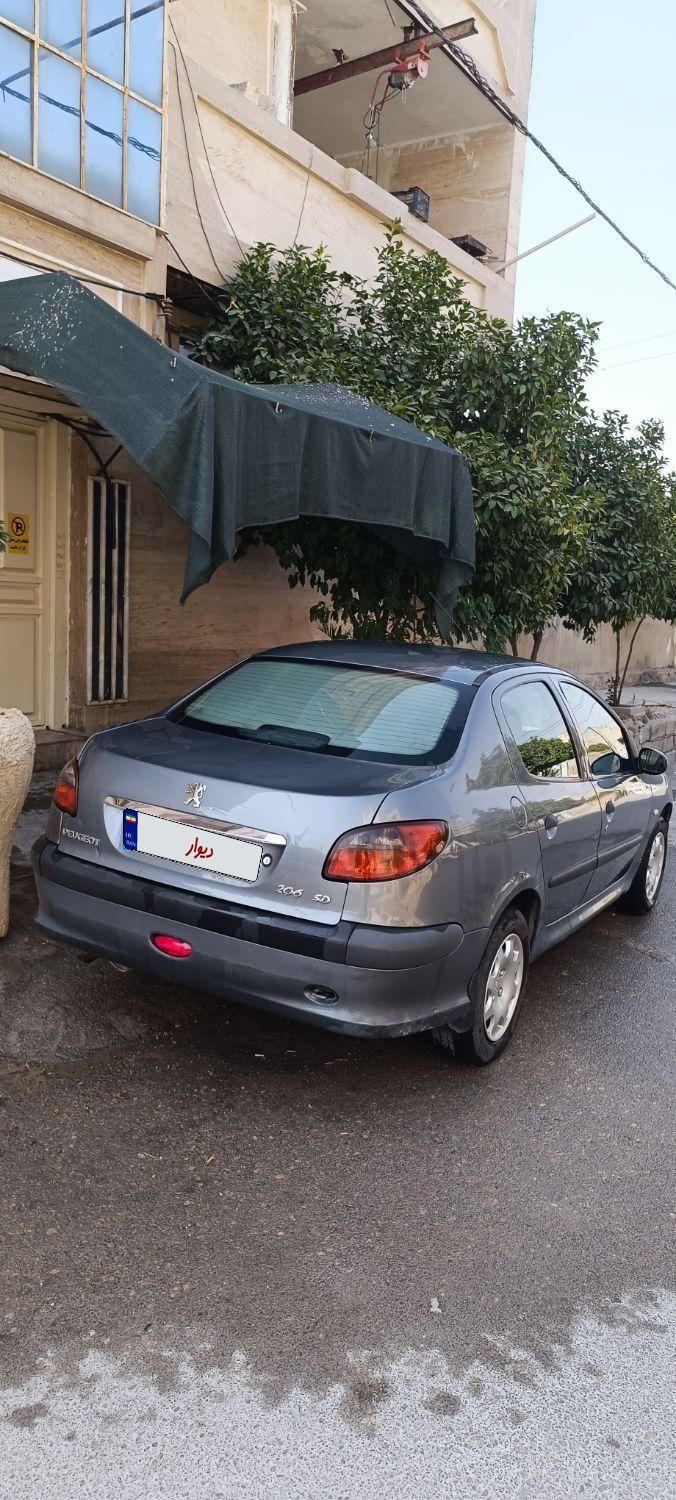 پژو ۲۰۶ صندوق دار v8 - 1391