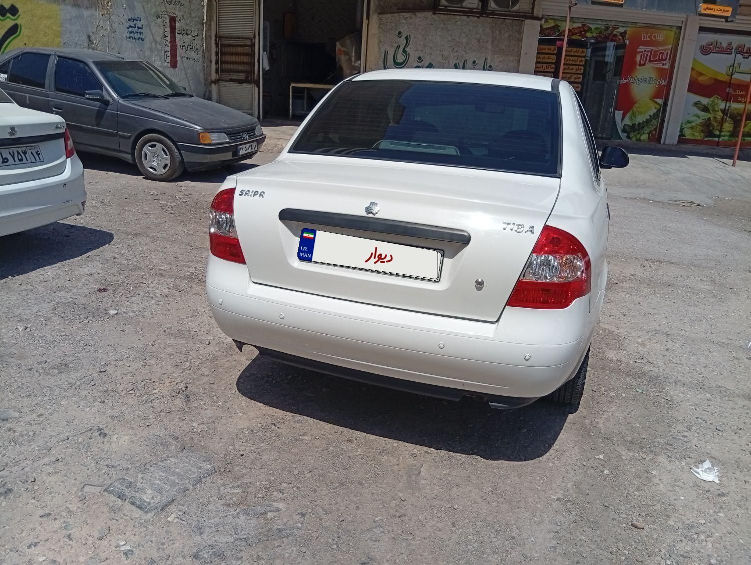 تیبا صندوق دار SX - 1401