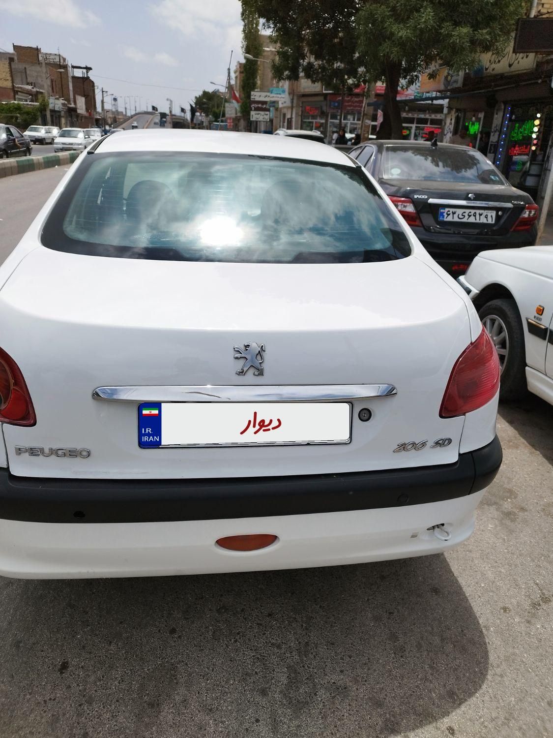پژو ۲۰۶ صندوق دار v8 - 1391