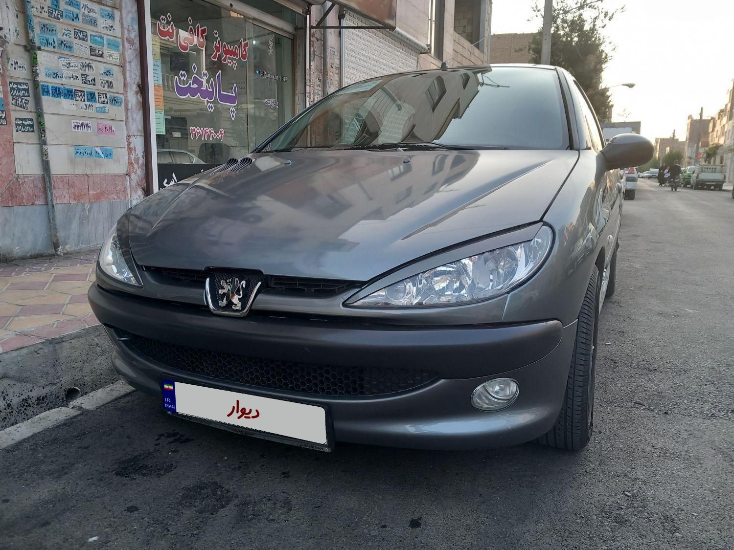 پژو ۲۰۶ صندوق دار v8 - 1396