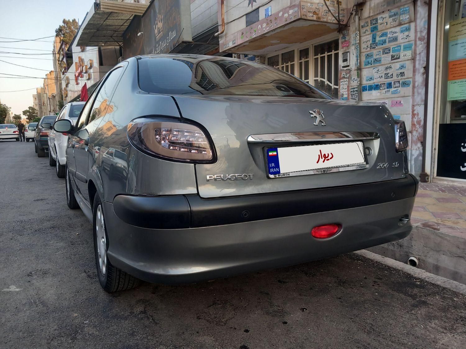 پژو ۲۰۶ صندوق دار v8 - 1396
