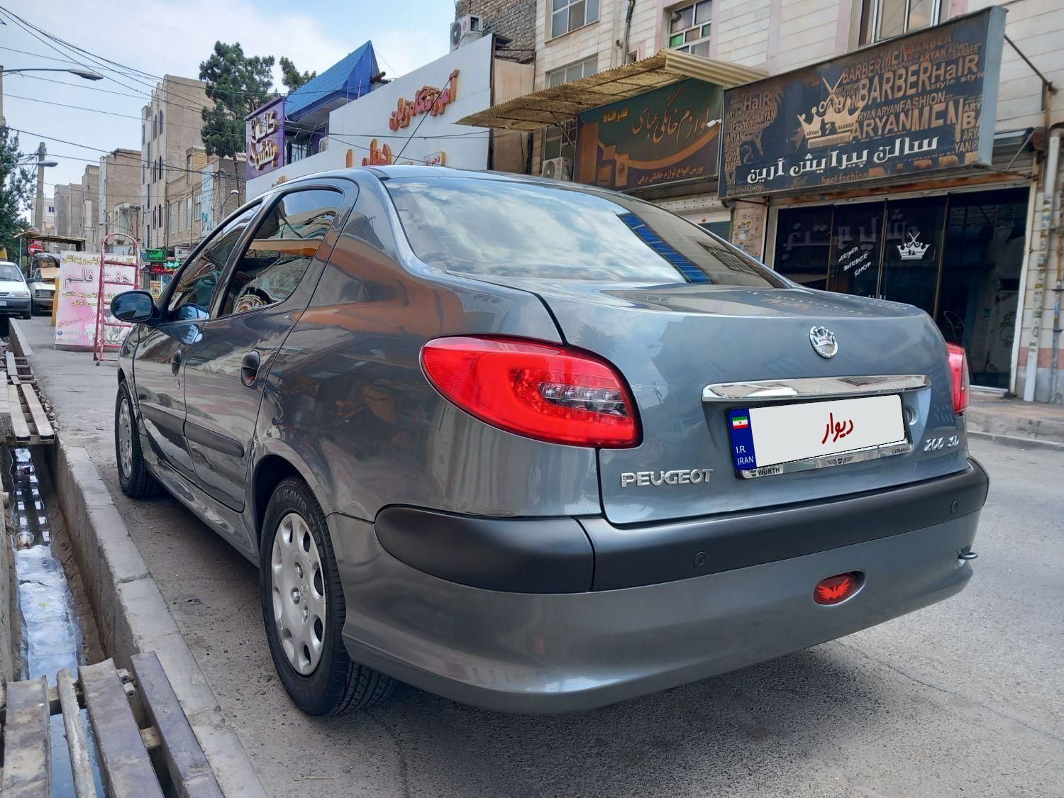 پژو ۲۰۶ صندوق دار v8 - 1396