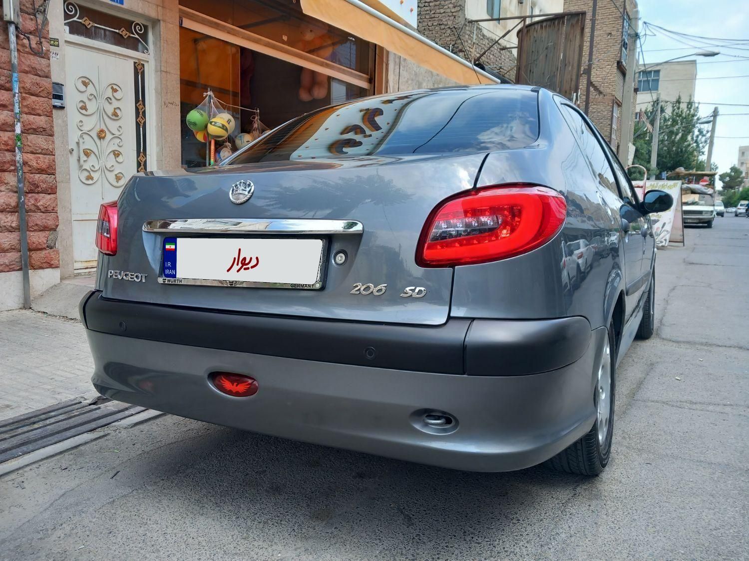 پژو ۲۰۶ صندوق دار v8 - 1396