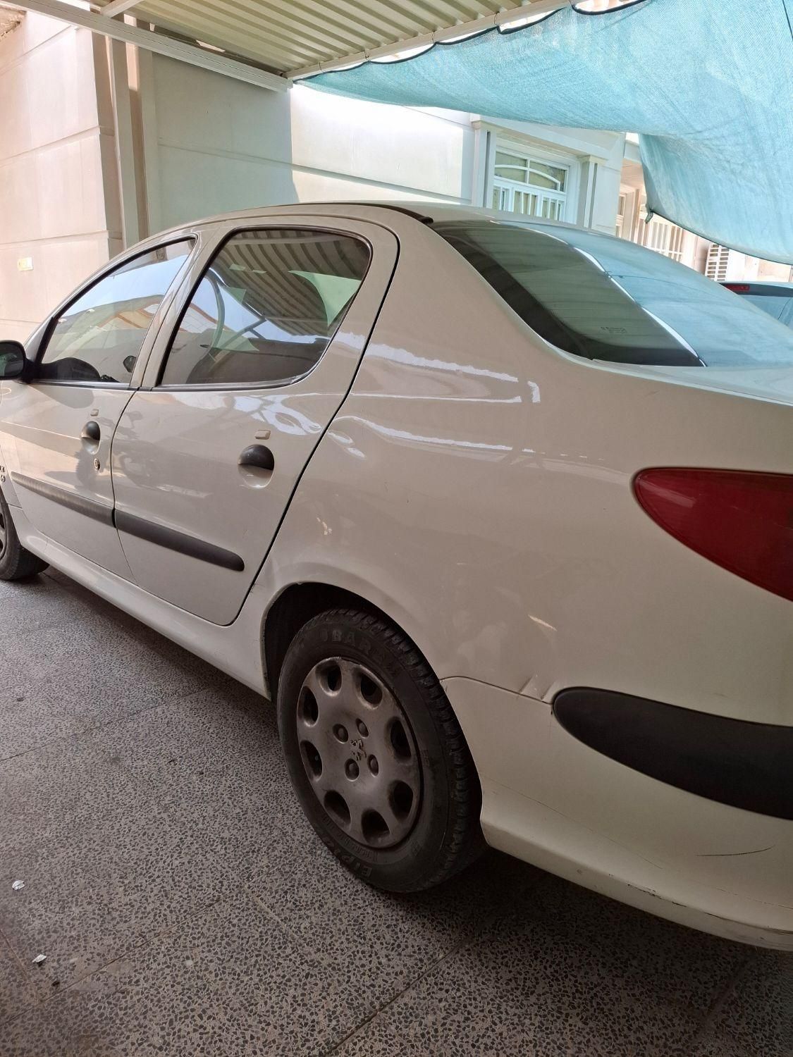 پژو ۲۰۶ صندوق دار v8 - 1396