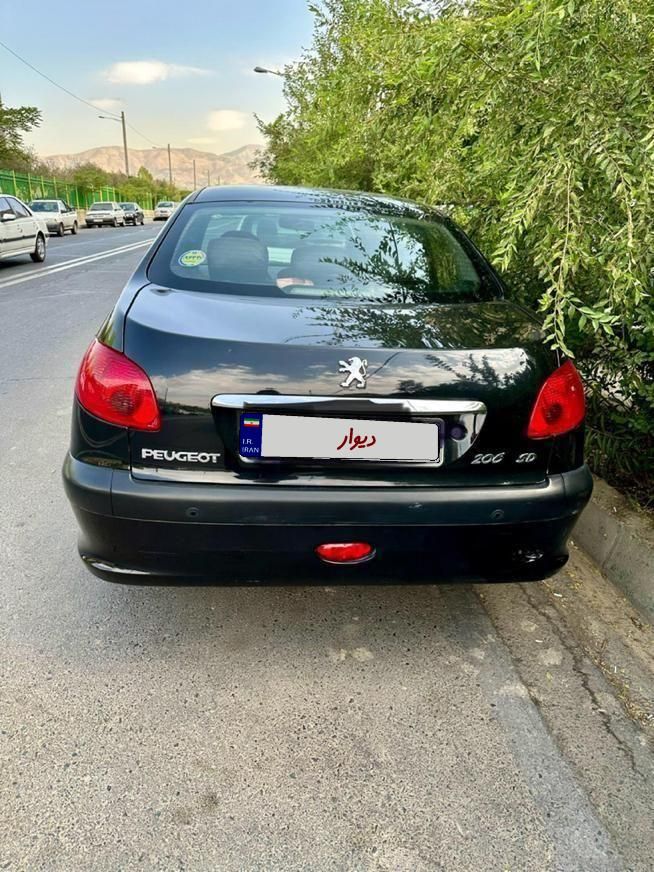 پژو ۲۰۶ صندوق دار v8 - 1400
